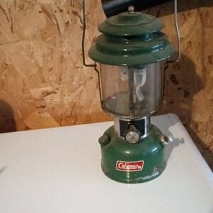 Coleman Green Metal Camping Lantern with Red Logo